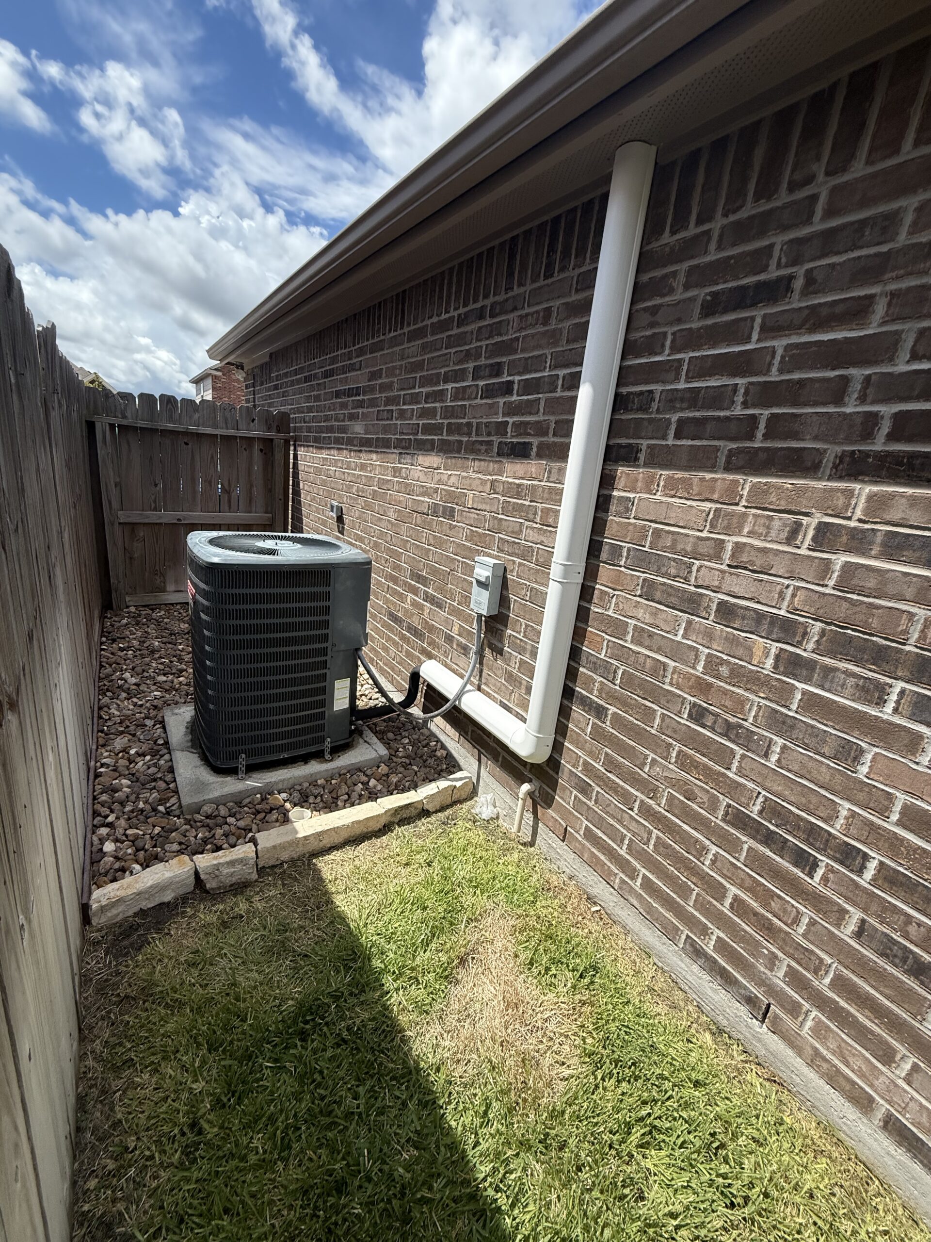 Cleaning AC condenser coil in San Antonio for better efficiency