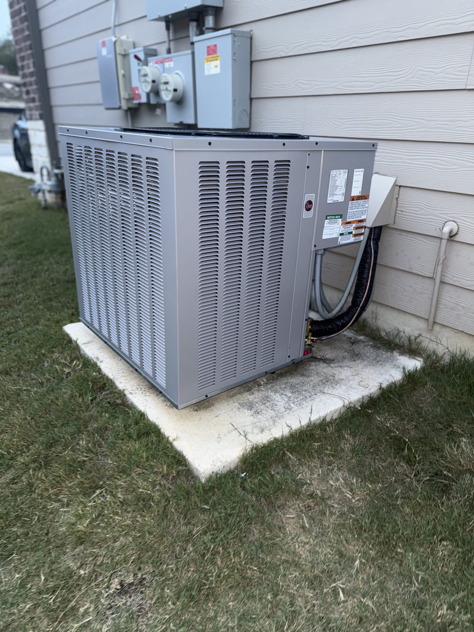 Inspecting AC disconnect and wiring at condenser in San Antonio