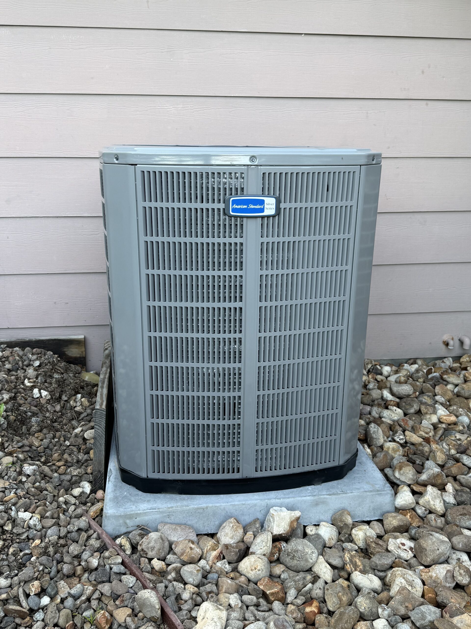 High-efficiency AC condenser installed at a San Antonio residence