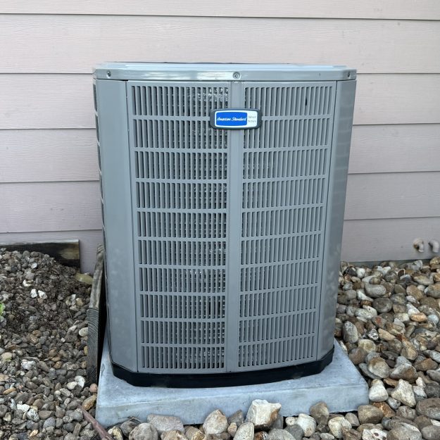 High-efficiency AC condenser installed at a San Antonio residence